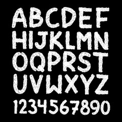 Scratched hand drawn letters and numbers font. bold comic modern marker lettering. Grunge font, Sans serif. Vector design. Isolated on black background. alphabet ink, brush. calligraphy, black