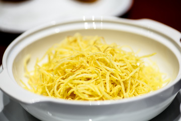 Potato pie is in the bowl.