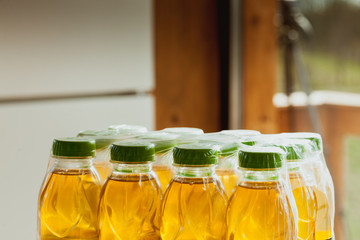 Apple juice carry pack with green cap