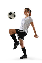 Naklejka premium Female Soccer Player Dribbling Ball