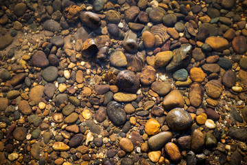 Nature background of stone in clear river water