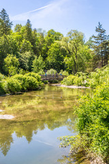 Fototapeta premium Landscape - River under a bridge on a nice day