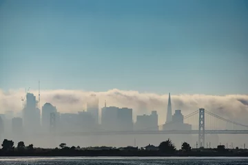 Foto op Canvas Fog Shrouding the San Francisco Skyline. © ferhan