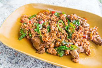 Stir-fried chicken with basil, popular Thai food.