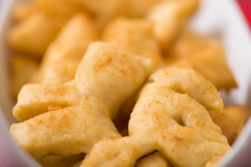 Closeup of delicious ecuadorian pristinos, piled up fresh from the fryer, traditional andean pastry suitable for coffee meetings