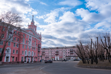 Fototapeta premium Komsomolsk-on-Amur, a pink building with a spire