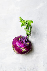 Purple kohlrabi cabbage, food background, top view
