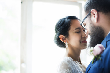 Closeup of Bride and Groom Staning Together Love