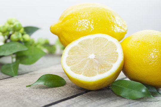 Lemons on the kitchen table, juicy fresh lemon.
