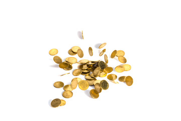 Falling gold coins. Money on a white background. shallow focus.