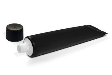 Tube of black color on a white background