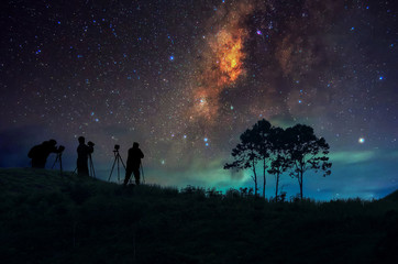Obraz na płótnie Canvas Silhouette man and Milky way