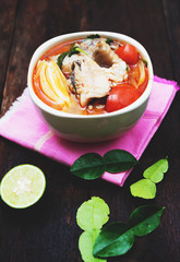 Tom yum soup with fish and spices hot spicy food