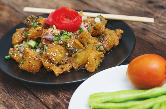 Fried spicy fish with vegetable