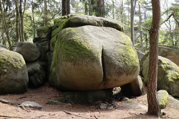 Rock structure Ďáblova prdel Devil´s ass in forest near Horni Meziricko, Czech republic