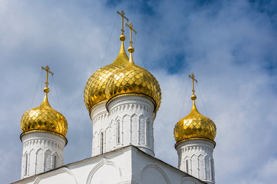 The Golden domes of the white Epiphany monastery of St. Anastasia convent in the city of Kostroma, Russia.