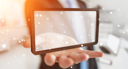 Businessman using digital screens tablet 3D rendering