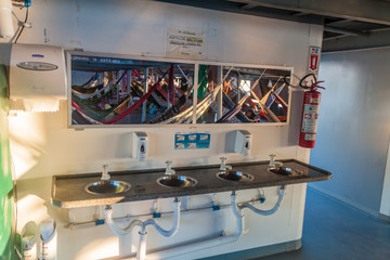 AMAZON, BRAZIL - JUNE 23, 2015: Sinks at the washroom at the boat Diamante which plies river Amazon between Tabatinga and Manaus, Brazil.
