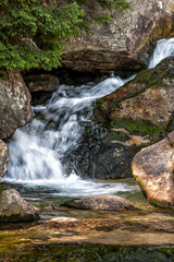 Waterfall on a stream in the forest, High Tatras National Park, SLovakia, Europe.