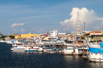 Fototapeta na wymiar SANTAREM, BRAZIL - JULY 29, 2015: River boats anchored in Santarem, Brazil