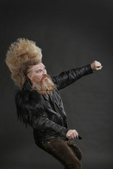 adult biker in black leather jackets and high mohawk