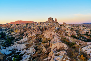 Top view of Uchisar town and castle at sunrise. Cappadocia. Turkey