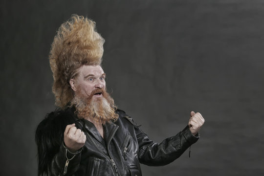 adult biker in black leather jackets and high mohawk