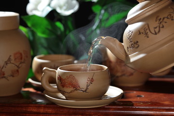 pouring tea in a tea ceremony