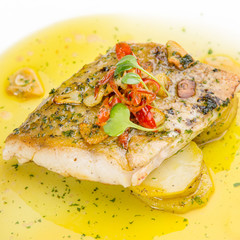 Fish fillet in butter lemon sauce
