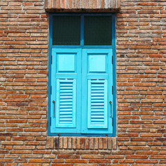 Old brick wall old blue window