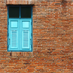 Old brick wall old blue window