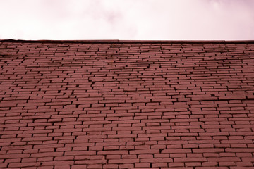 Red bricks wall grey sky texture