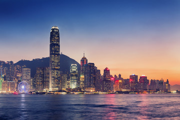 Hong Kong City Skyscraper Buildings and Business Financial District Central, Landmark Harbor View of Hong Kong City Skyline and Skyscrapers Cityscape Downtown at Sunset. Travel Sightseeing of HongKong - obrazy, fototapety, plakaty