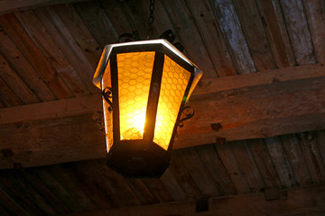 Lantern inside tower of Medzhybizh castle, Ukraine. Medzhybizh Castle, built as a bulwark against...