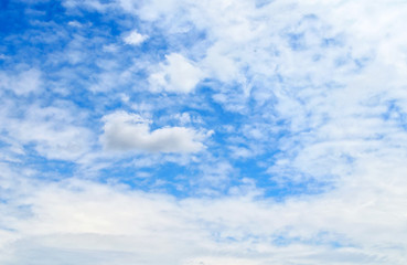 Naklejka na ściany i meble Beautiful white clouds in the blue sky.