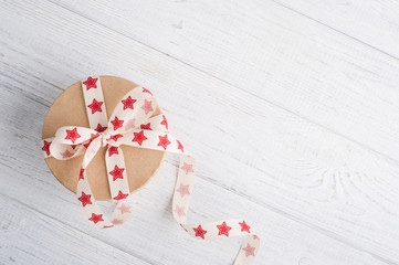 Gift Box with red star ribbon