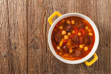 Traditional chickpea soup with paprika and chorizo sausage.