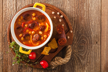 Traditional chickpea soup with paprika and chorizo sausage.