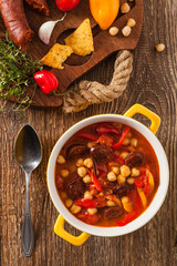 Traditional chickpea soup with paprika and chorizo sausage.