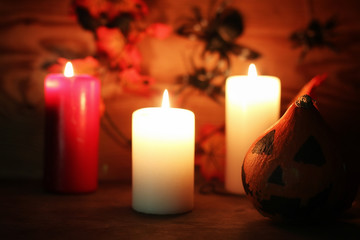 table decorations for Halloween carved pumpkin head candles