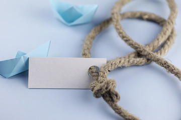 sticker with thick braided rope and ship paper origami