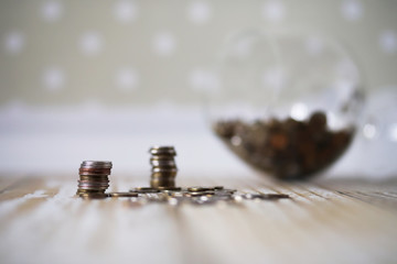 coins stacked in piles on the floor