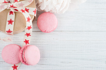 Pink macaroons and kraft gift box