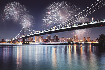 Fototapeta na wymiar Night city with fireworks wallpaper