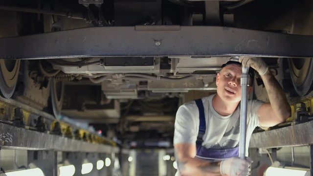 a man repairing a train
