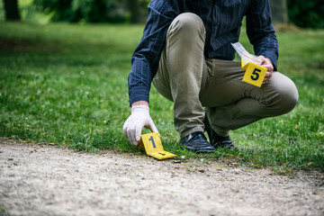 Crime scene investigation, placing the crime scene marker on the ground