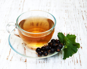 Cup of tea and black currant
