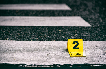 Crime scene marker on the asphalt