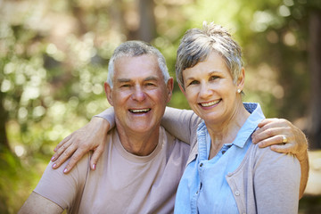 Portrait Of Loving Mature Couple In Countryside Together