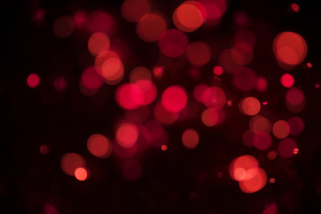 Abstract red glitter bokeh. concept christmas and new year for background.